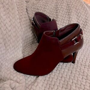 Size 8 burgundy suede booties with gold buckle. Heel stilettos.